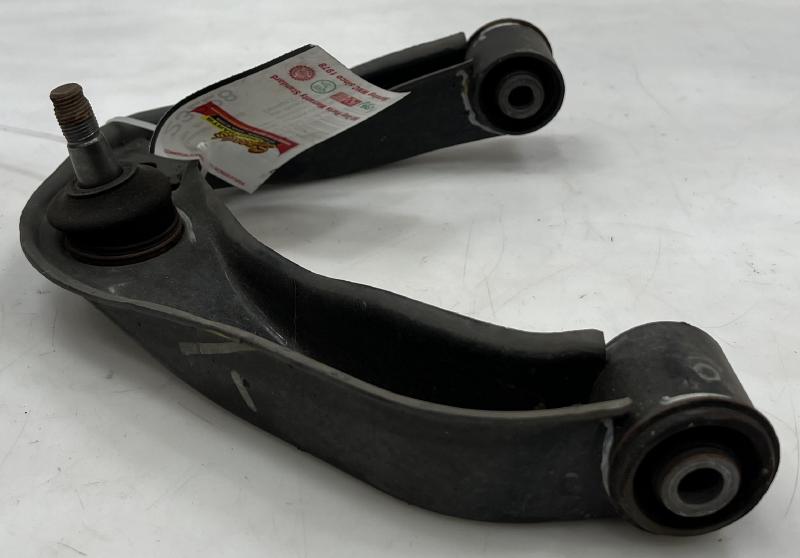 2005 - 2022 Nissan Frontier Front Upper Control Arm RH Passenger Side OEM 54524EA00A